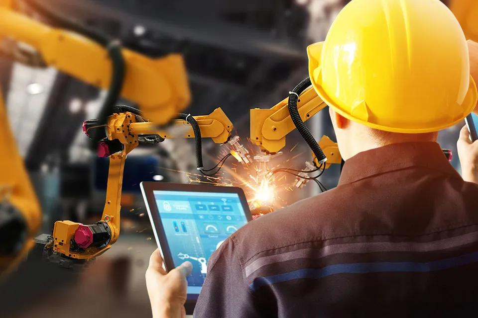 Engineer check and control welding robotics automatic arms machine in intelligent factory automotive industrial with monitoring system software. Digital manufacturing operation. Industry 4.0; Shutterstock ID 1154438635; Purchase Order: GF Machining Solutions; Job: Milling Brochure; Client/Licensee: GF Machining Solutions