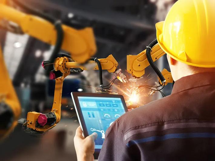 Engineer check and control welding robotics automatic arms machine in intelligent factory automotive industrial with monitoring system software. Digital manufacturing operation. Industry 4.0; Shutterstock ID 1154438635; Purchase Order: GF Machining Solutions; Job: Milling Brochure; Client/Licensee: GF Machining Solutions